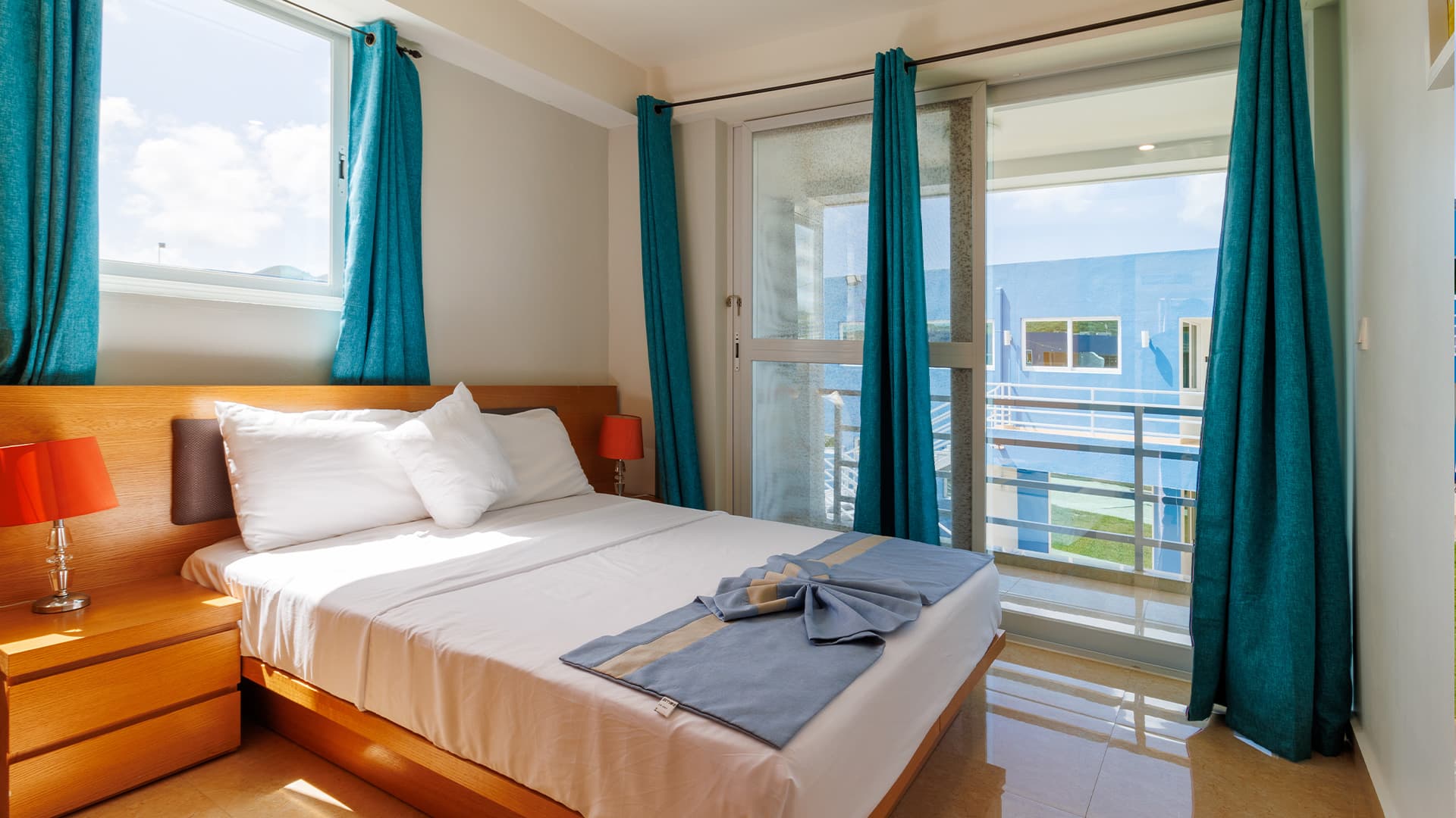 Bright Bedroom with view of other Harbour Island Residences buildings from the window