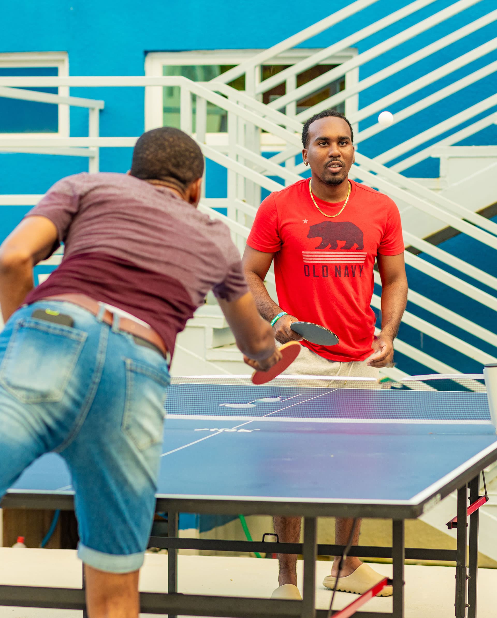 Playing table tennis at Harbour Island Residences
